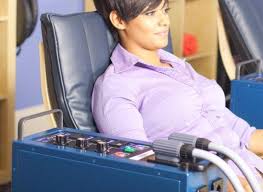 Woman on PEMF Chair Pad